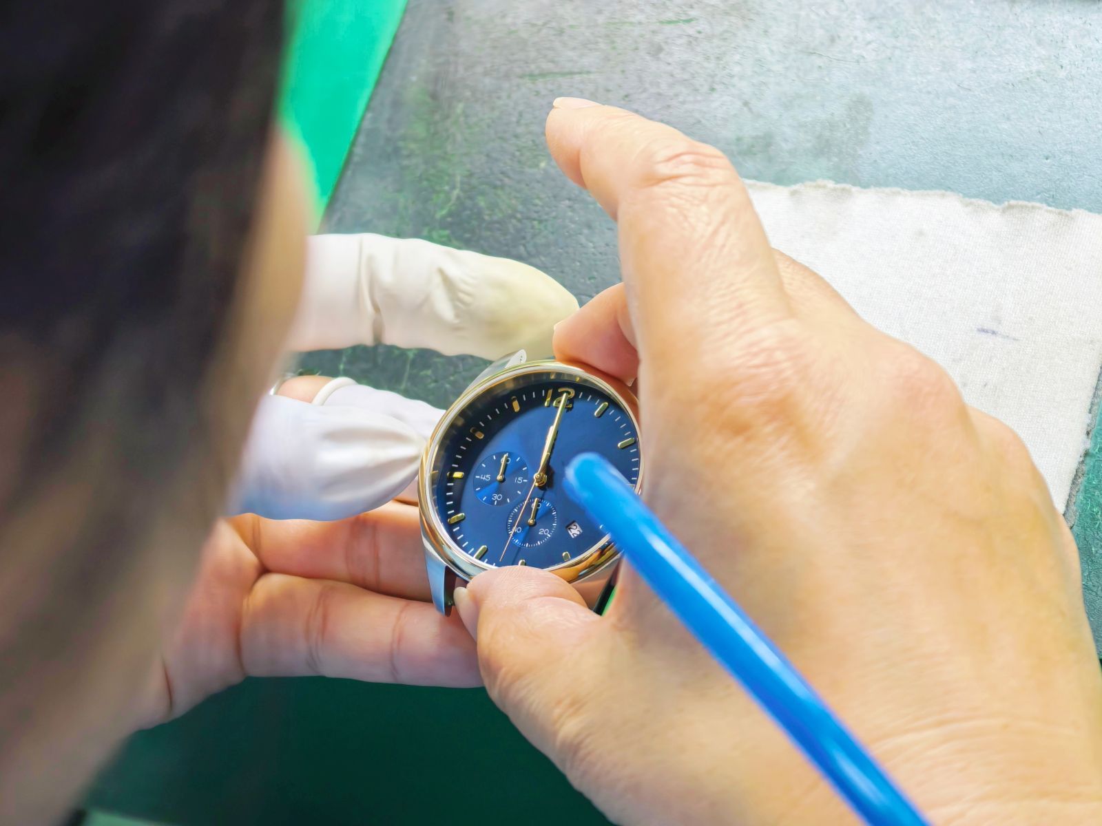 Dial assembly process during OEM watch production in Shenzhen.