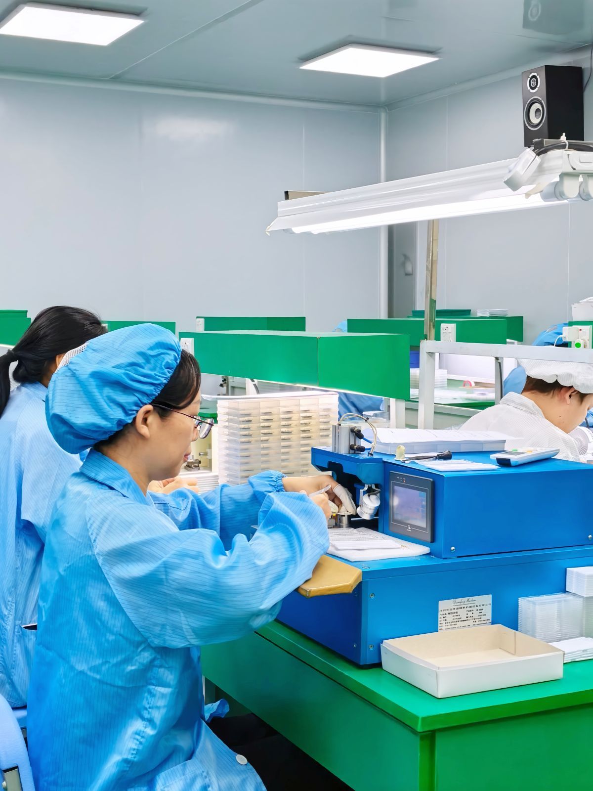 Hand setting process in a controlled watch assembly line in Shenzhen.