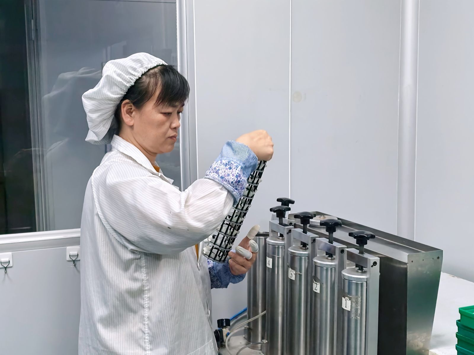 Water resistance testing equipment in the factory quality control area.