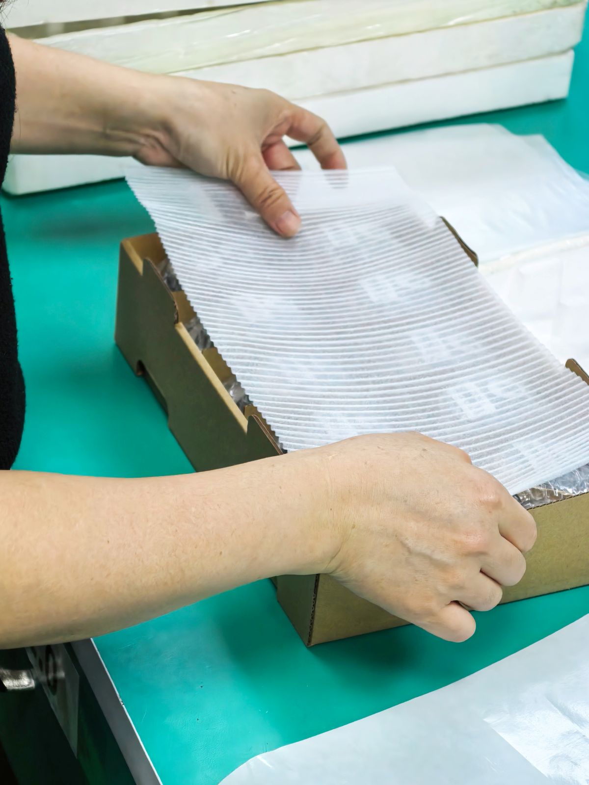 Protective wrap and packing control during watch shipment preparation.